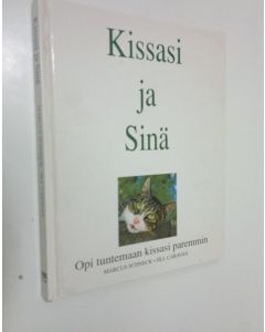 Kirjailijan Marcus Schneck käytetty kirja Kissasi ja sinä