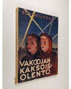 Kirjailijan Roy Wilton käytetty kirja Vakoojan kaksoisolento : seikkailuromaani miehitetystä Hollannista