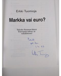 Kirjailijan Erkki Tuomioja käytetty kirja Markka vai euro : tuleeko Suomen liittyä Euroopan talous- ja rahaliittoon (signeerattu)