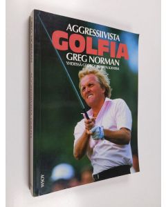 Kirjailijan Greg Norman käytetty kirja Aggressiivista golfia yhdessä George Peperin kanssa