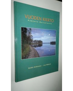 Tekijän Heikki Kokkonen  käytetty kirja Vuoden kierto Pohjois-Karjalassa (ERINOMAINEN)