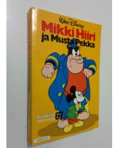 Kirjailijan Walt Disney käytetty kirja Mikki Hiiri ja Musta Pekka