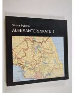 Kirjailijan Saara Peltola käytetty kirja Aleksanterinkatu 1 : pakolaisperheen elämää ja taustaa 1930- ja 40-luvuilla