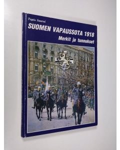 Kirjailijan Tapio Saarni käytetty kirja Suomen Vapaussota 1918 : merkit ja tunnukset (numeroitu)