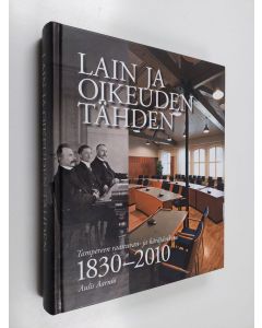 Kirjailijan Aulis Aarnio käytetty kirja Lain ja oikeuden tähden : Tampereen raastuvan- ja käräjäoikeus vuosina 1830-2010