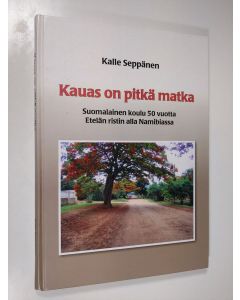Kirjailijan Kalle Seppänen käytetty kirja Kauas on pitkä matka : suomalainen koulu 50 vuotta Etelän ristin alla Namibiassa