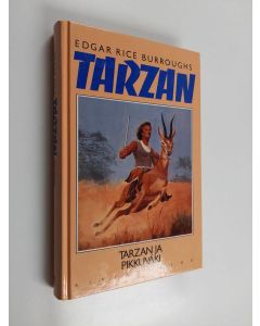 Kirjailijan Edgar Rice Burroughs käytetty kirja Tarzan ja pikkuväki