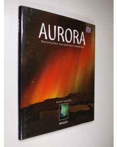 Kirjailijan Jouni Jussila käytetty kirja Aurora : revontulien taivaallinen näytelmä