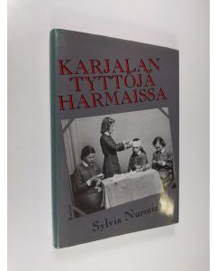 Kirjailijan Sylvia Nurminen käytetty kirja Karjalan tyttöjä harmaissa (signeerattu)