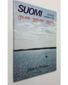 Kirjailijan Matti A. Pitkänen käytetty kirja Suomi - järvien ja metsien maa = Finland i bild = Finnland in Bildern