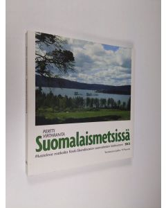 Kirjailijan Pertti Virtaranta käytetty kirja Suomalaismetsissä : muistelmia matkoilta Keski-Skandinavian suomalaisten keskuuteen