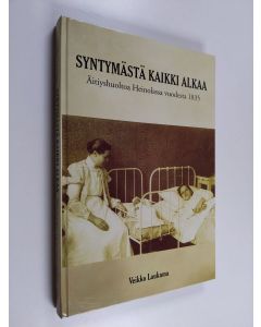 Kirjailijan Veikko Laukama käytetty kirja Syntymästä kaikki alkaa : äitiyshuoltoa Heinolassa vuodesta 1835