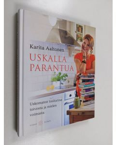 Kirjailijan Karita Aaltonen käytetty kirja Uskalla parantua : uskomaton tositarina toivosta ja mielen voimasta