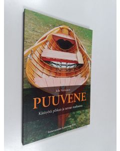 Kirjailijan Juha Vartiainen käytetty kirja Puuvene : käsityötä pihkan ja tervan tuoksussa