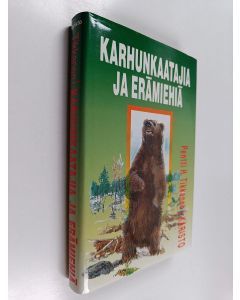 Kirjailijan Pentti H. Tikkanen käytetty kirja Karhunkaatajia ja erämiehiä