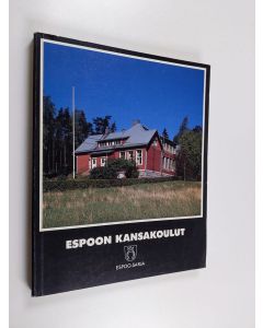Kirjailijan Veli Nurmi käytetty kirja Espoon kansakoulut 1871-1921