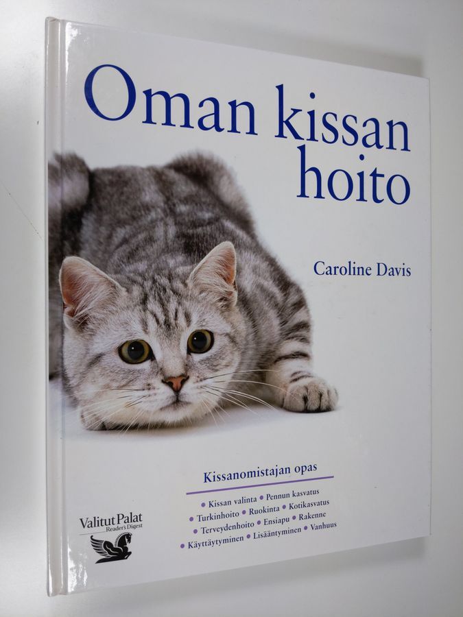 Caroline Davis : Oman kissan hoito - Kissanomistajan opas